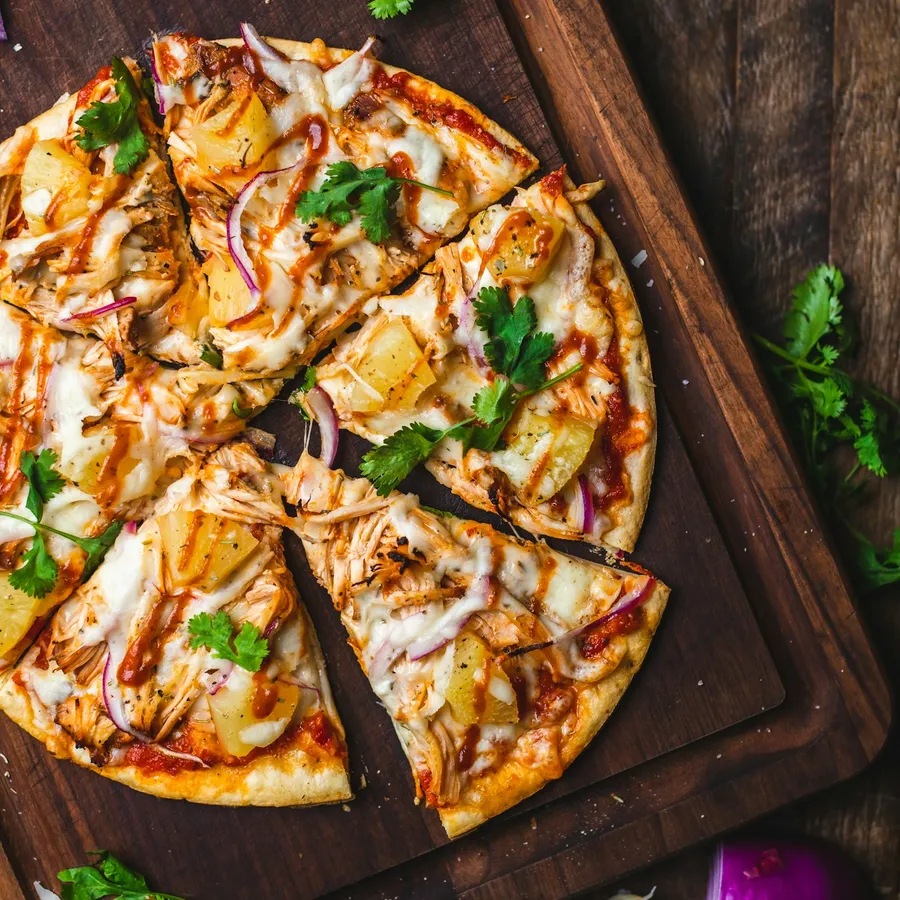 Chicken shawarma pizza on a board